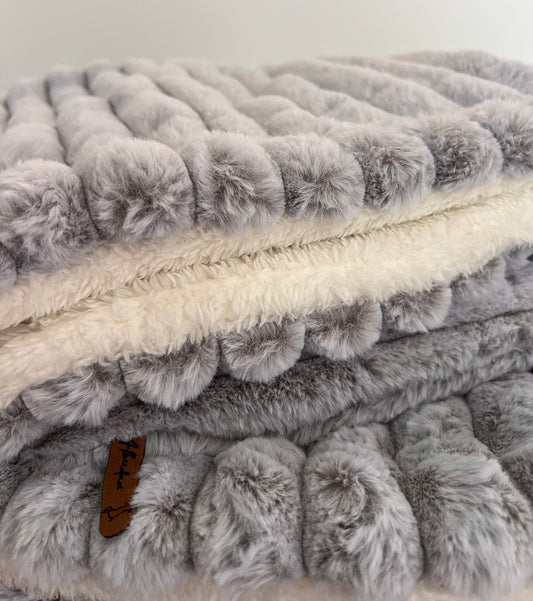 Snuggle sacks in Snow Leopard with soft cosy lining in cream