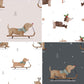 Set of four fabric swatches featuring dachshund dogs in winter-themed patterns.