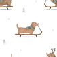 Illustration of a dog on a sled with a scarf, surrounded by small trees and stars on a white background.